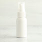 1 oz White PET Boston Round Bottle with 20-410 White Treatment Pump