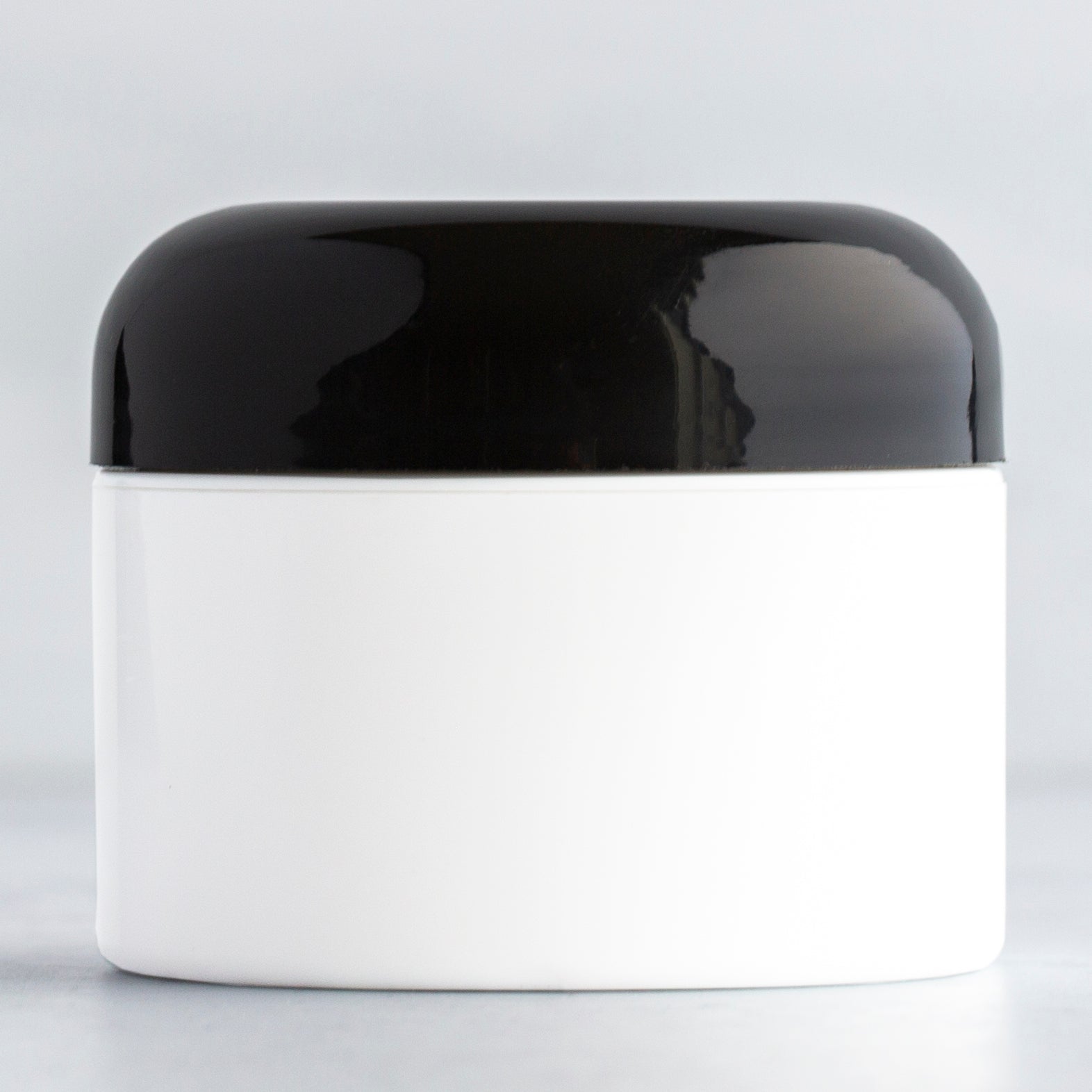 1 oz White Square Base Plastic Jar with Black Dome Cap