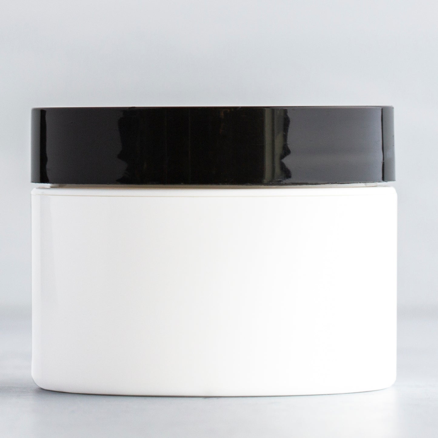 1 oz White Square Base Plastic Jar with Black Gloss Flat Cap