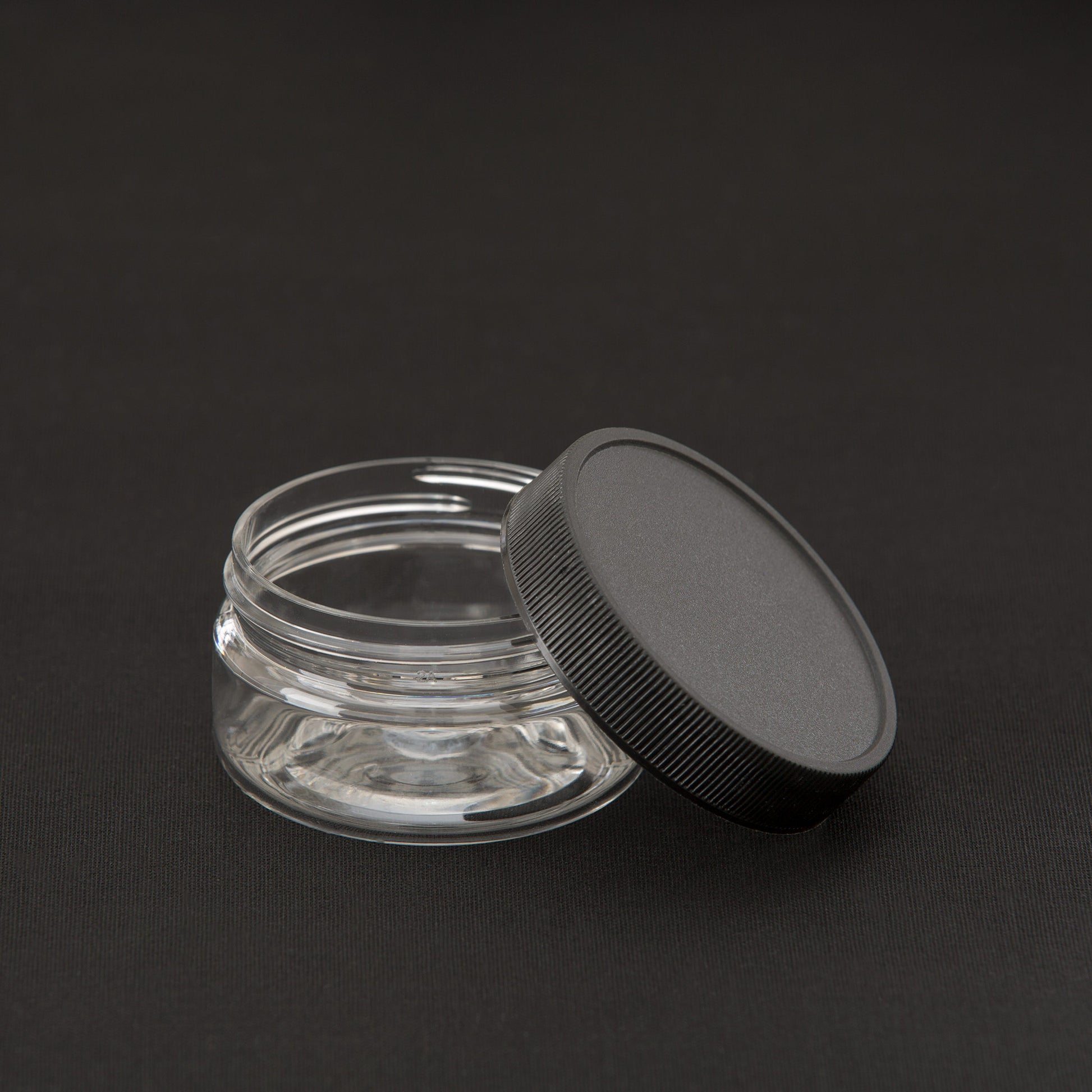 2 oz Clear Shallow Jar with Black Ribbed Flat Cap