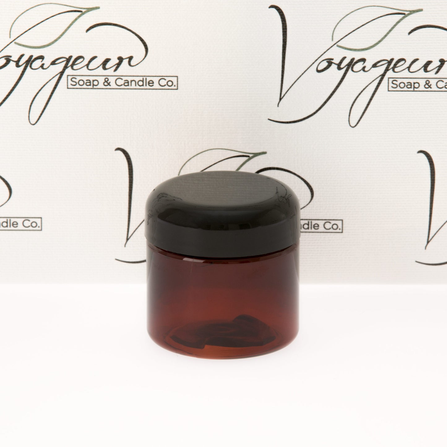 2 oz Amber Straight Sided Jar with Black Dome Cap