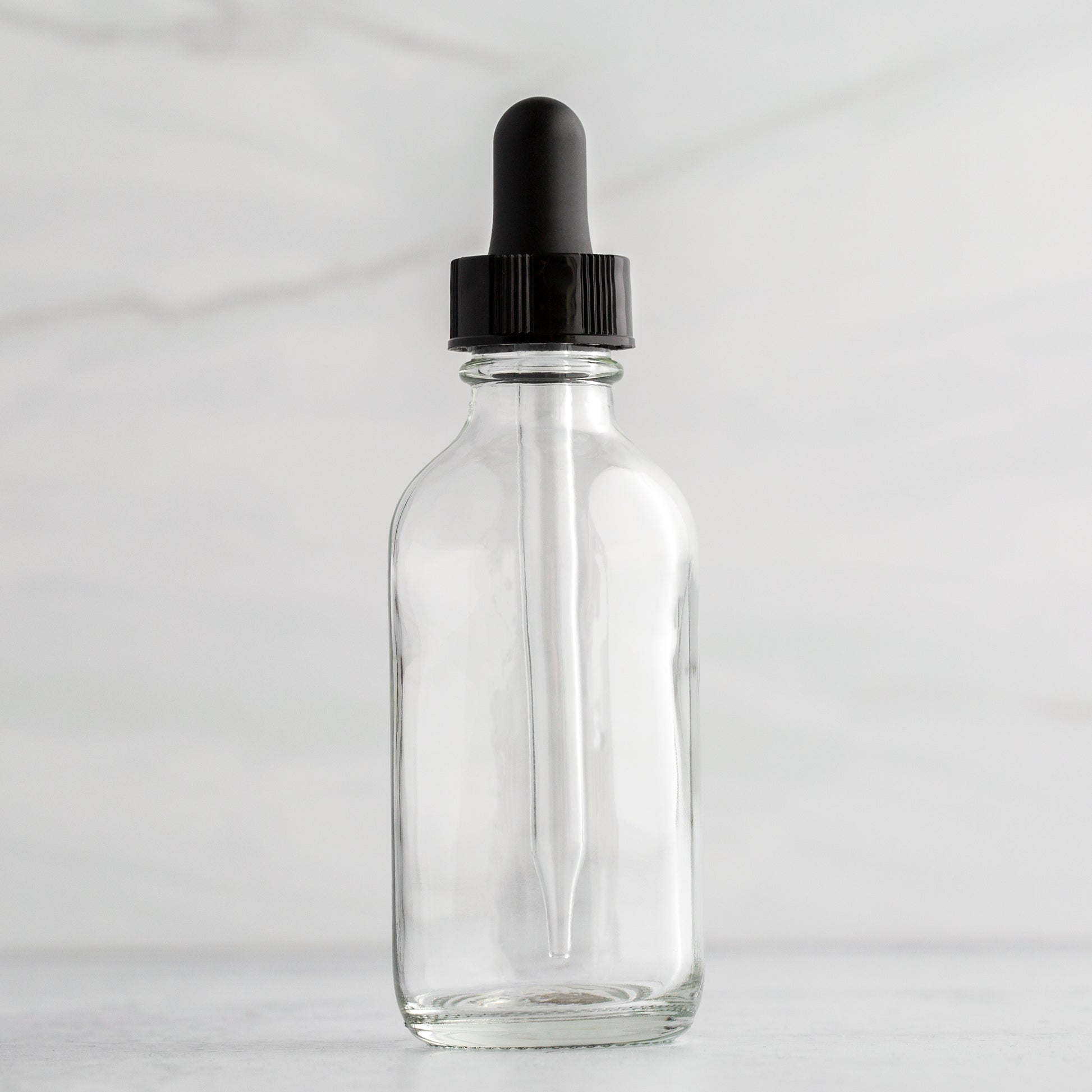 2 oz Clear Glass Bottle with Black Glass Tube Dropper
