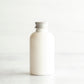 2 oz White PET Boston Round Bottle with 20-410 Aluminum Cap