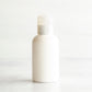 2 oz White PET Boston Round Bottle with 20-410 Natural Disc Cap