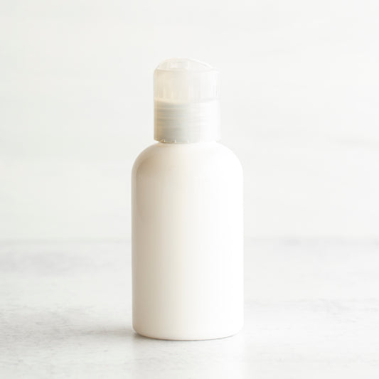 2 oz White PET Boston Round Bottle with 20-410 Natural Disc Cap