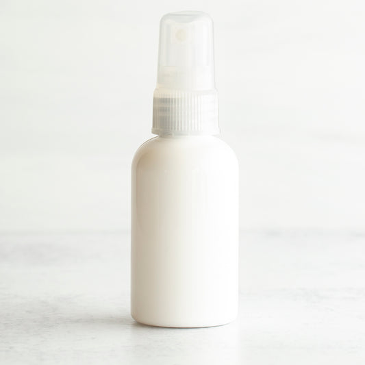 2 oz White PET Boston Round Bottle with 20-410 Natural Fine Mist Sprayer