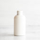 2 oz White PET Boston Round Bottle Without Closure