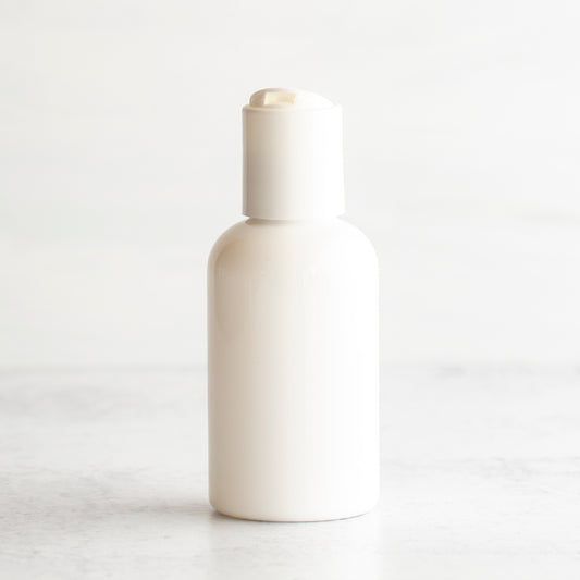 2 oz White PET Boston Round Bottle with 20-410 White Disc Cap