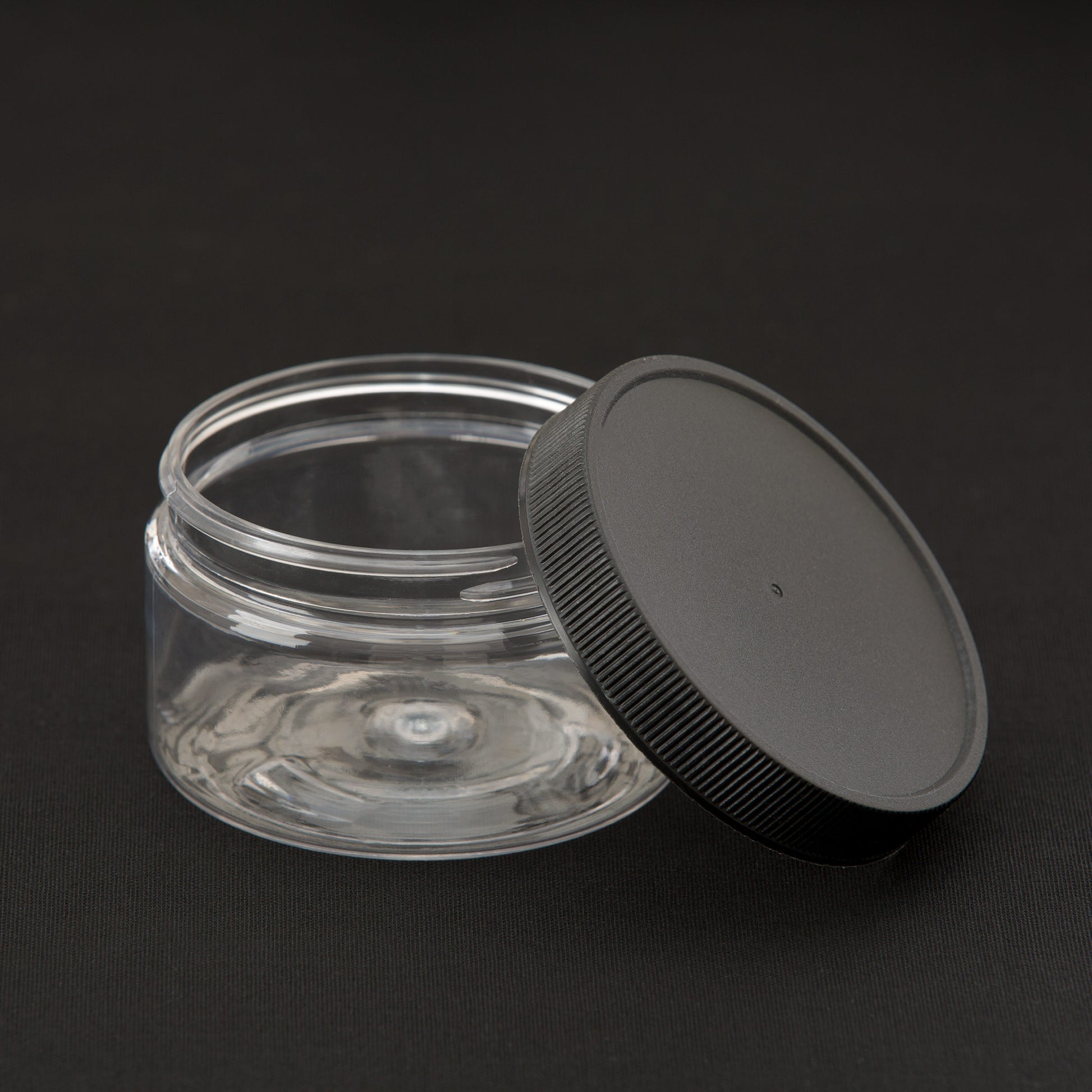 4 oz Clear Shallow Jar with Black Ribbed Cap