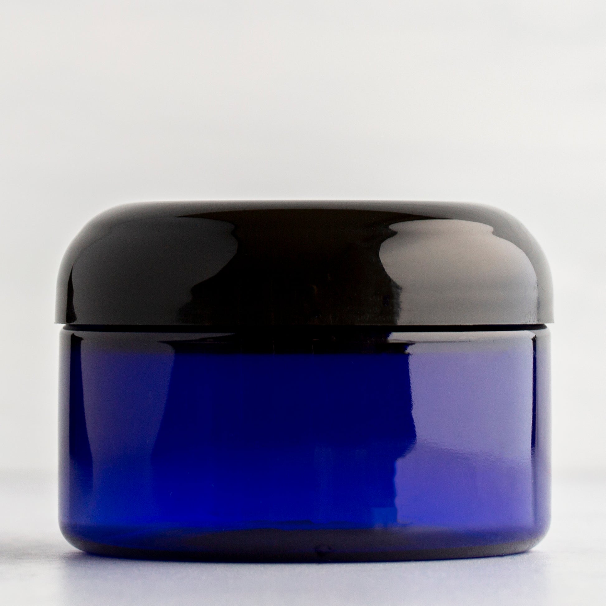 4 oz Blue Shallow Plastic Jar with Black Dome Cap