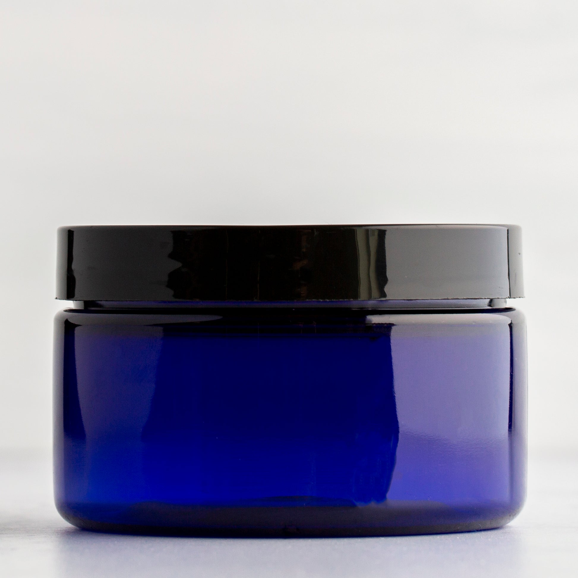 4 oz Blue Shallow Plastic Jar with Black Flat Gloss Cap