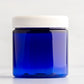 4 oz Blue Straight Side Plastic Jar with White Ribbed Cap