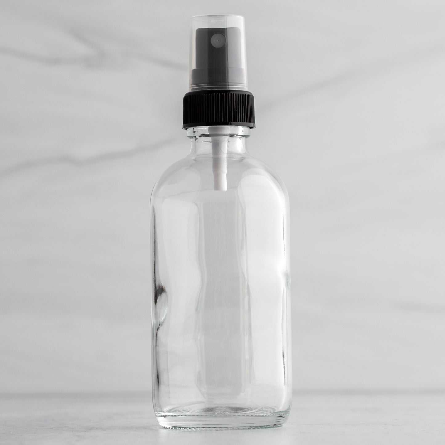 4 oz Clear Glass Bottle with Black Mister