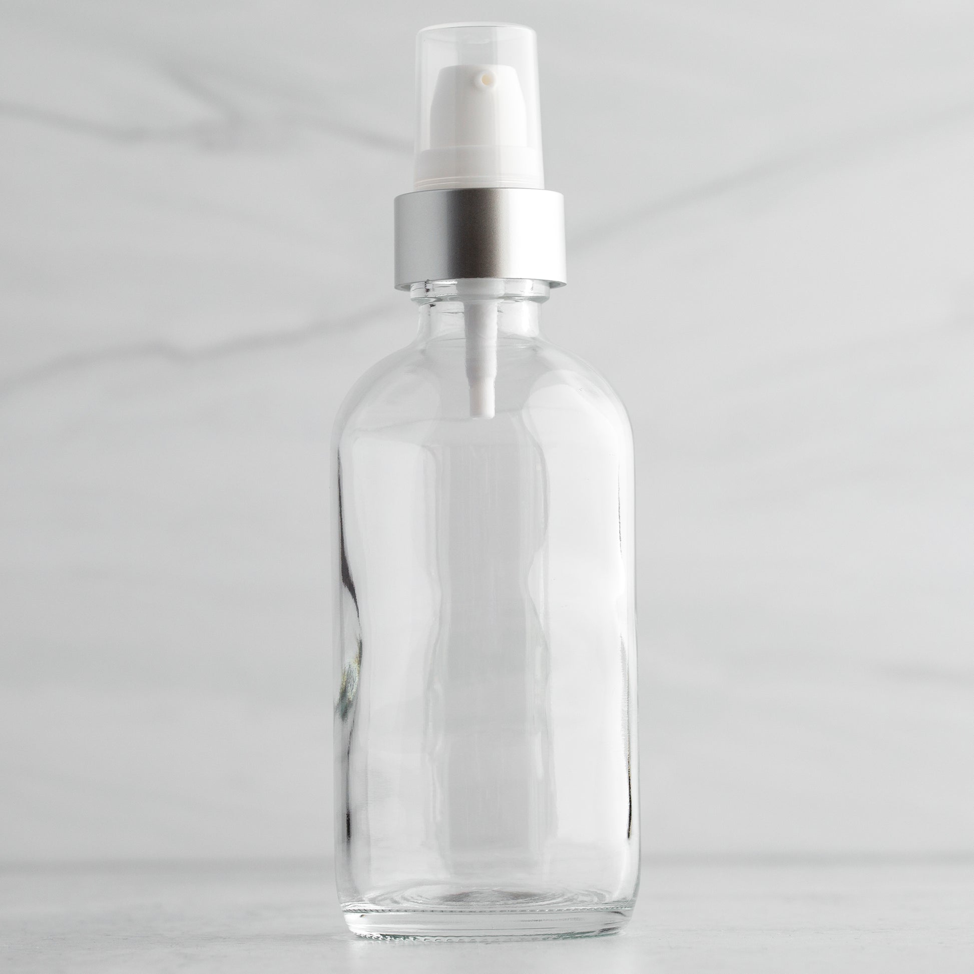 4 oz Clear Glass Bottle with 22400 White Treatment Pump with Brushed