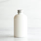 4 oz White PET Boston Round Bottle with 20-410 Aluminum Cap