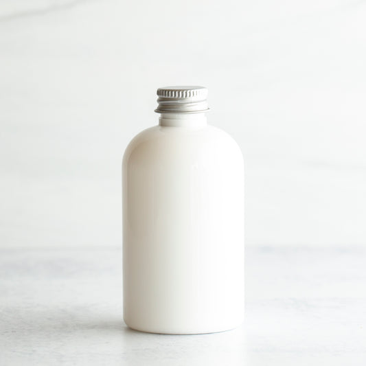 4 oz White PET Boston Round Bottle with 20-410 Aluminum Cap