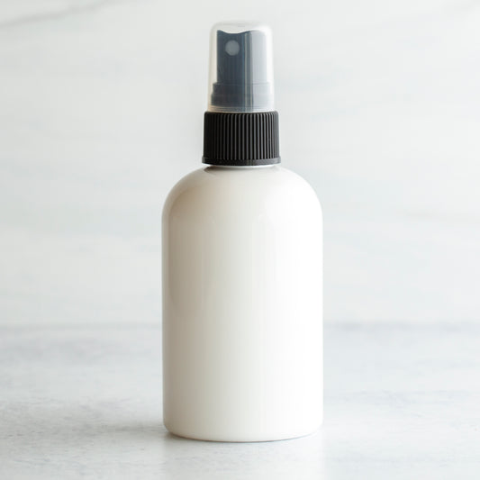 4 oz White PET Boston Round Bottle with 20-410 Black Fine Mist Sprayer