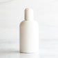 4 oz White PET Boston Round Bottle with 20-410 White Disc Cap