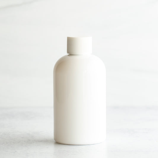4 oz White PET Boston Round Bottle with 20-410 White Ribbed Cap