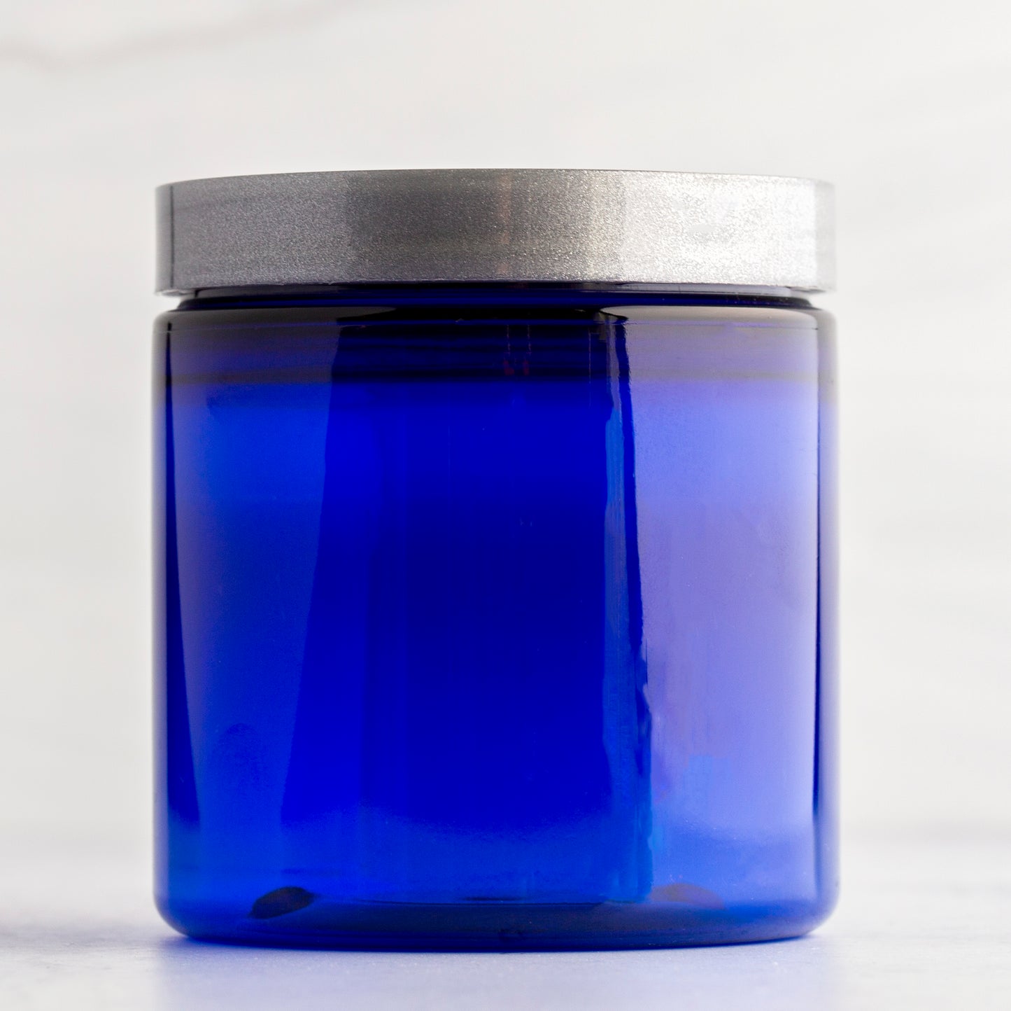 8 oz Blue Straight Side Plastic Jar with Silver Flat Gloss Cap
