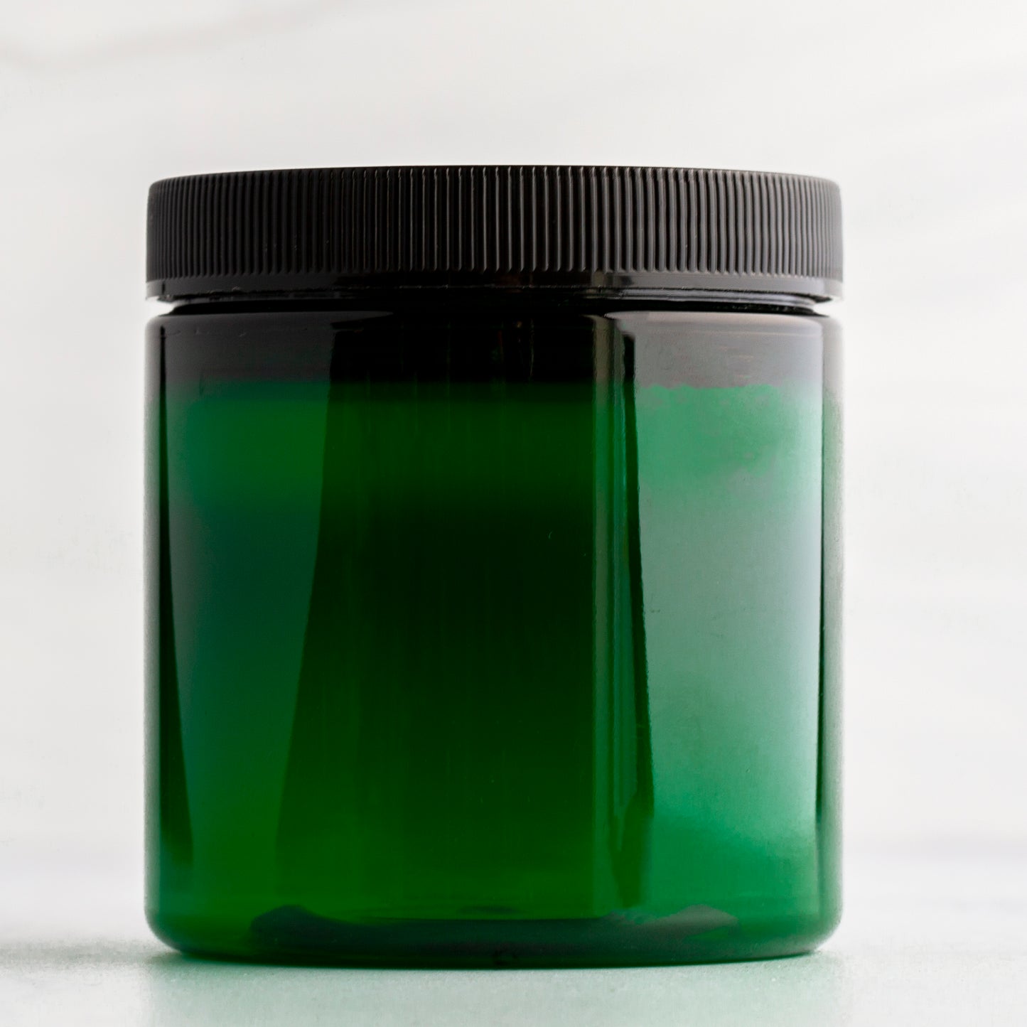 8 oz Green Straight Sided Plastic Jar with Black Ribbed Cap