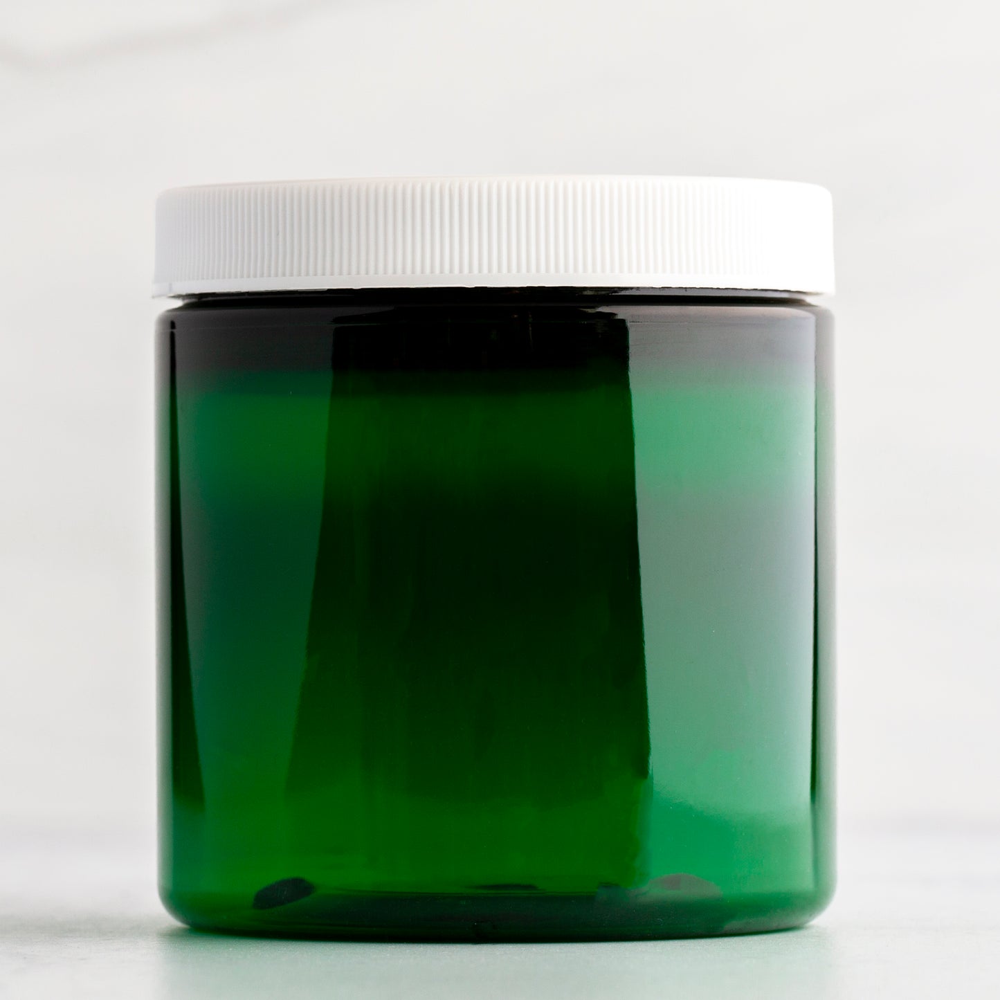 8 oz Green Straight Sided Plastic Jar with White Ribbed Cap
