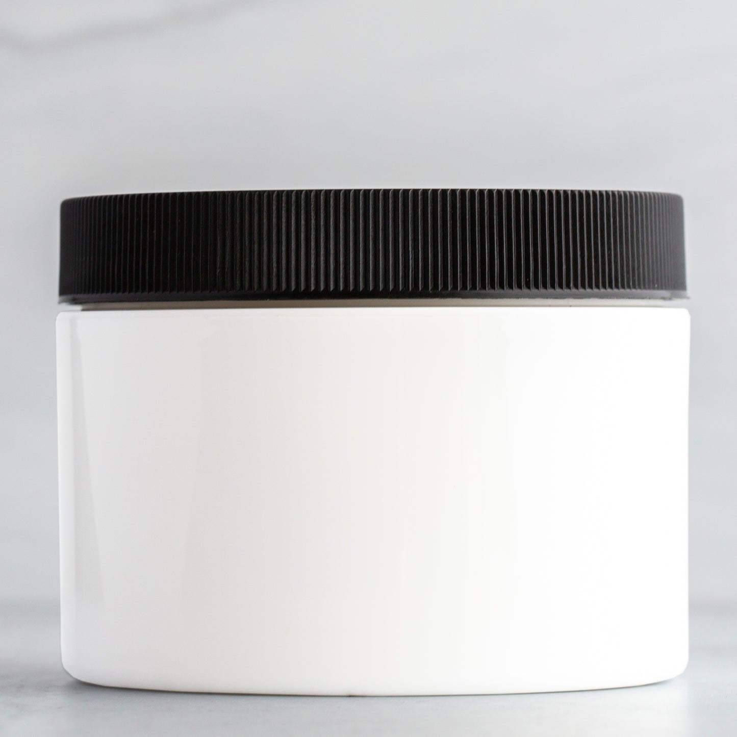8 oz White Square Base Plastic Jar with Black Ribbed Cap