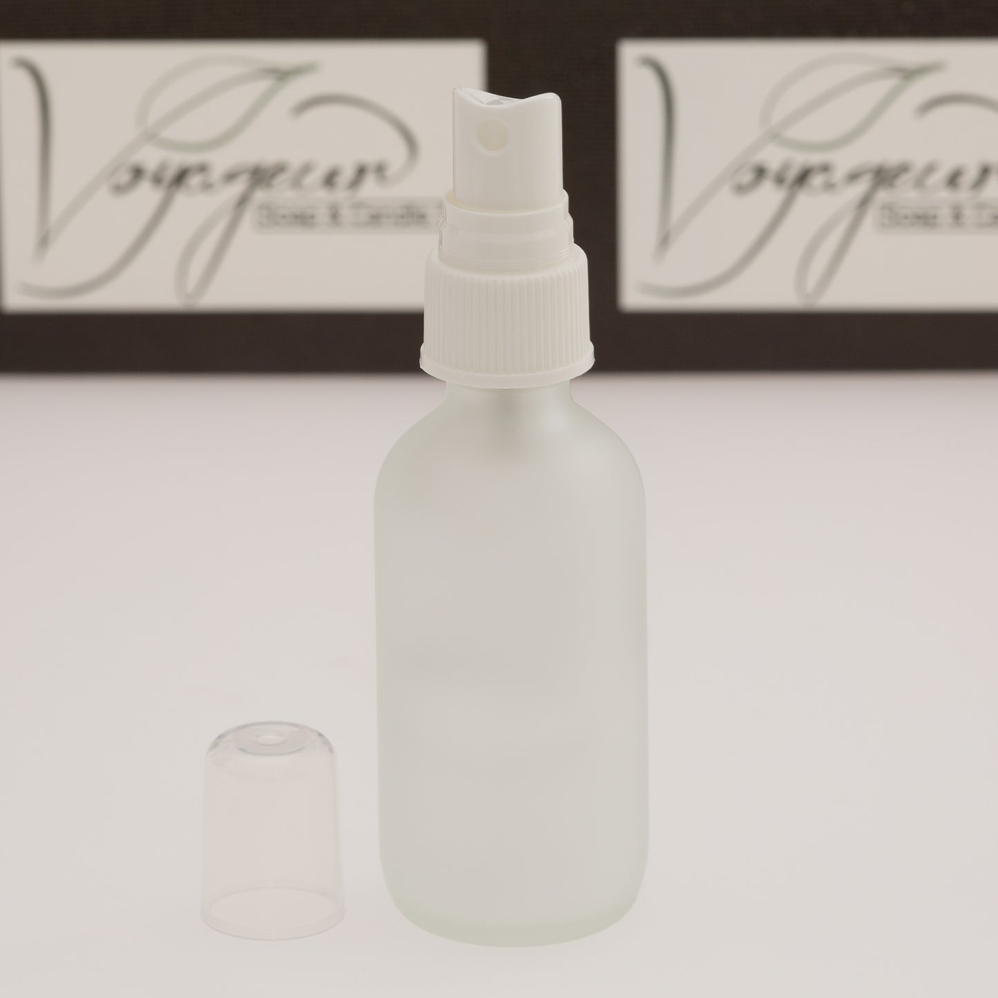 2 oz Frosted Glass Bottle with 20-400 White Fine Mist Sprayer