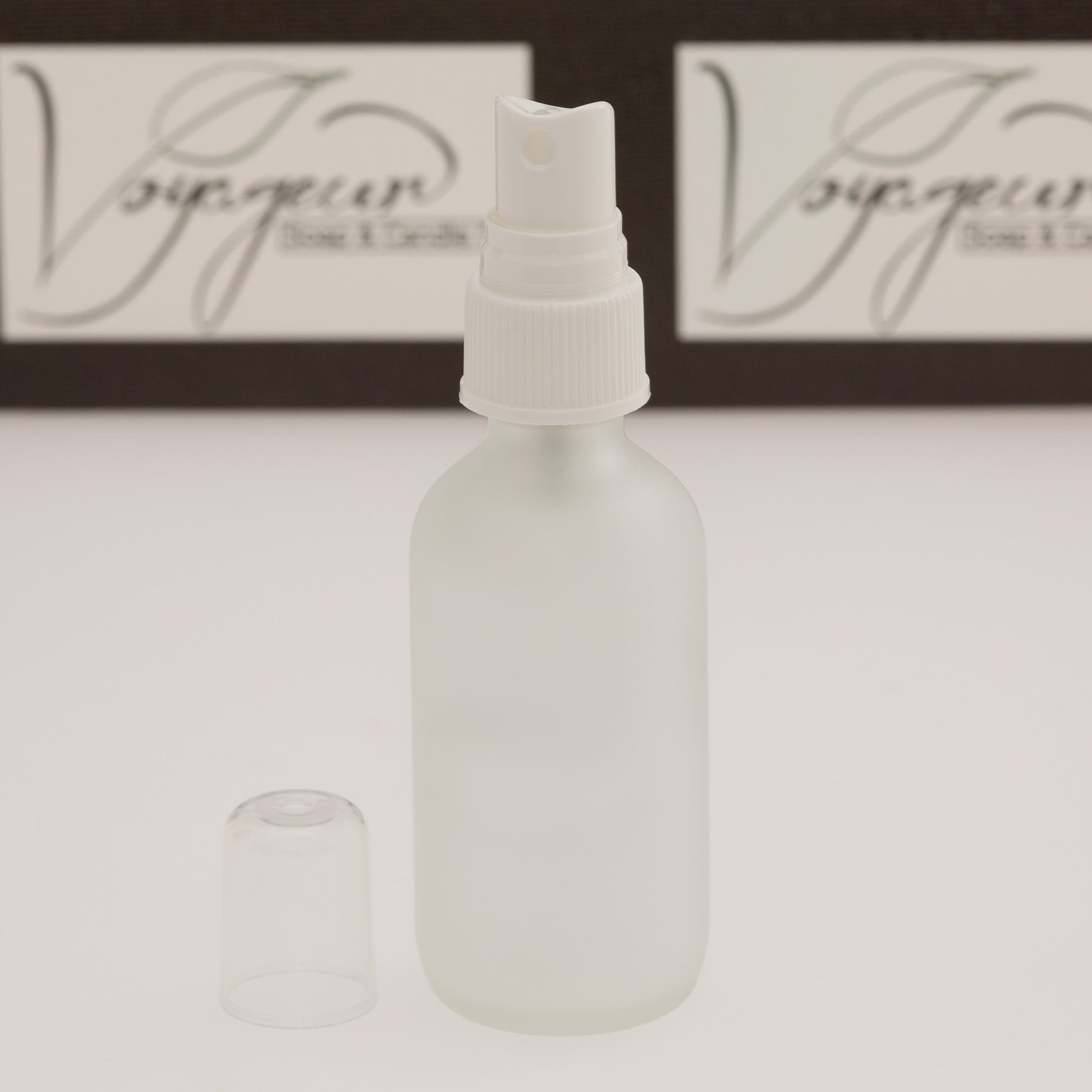 2 oz Frosted Glass Bottle with 20-400 White Fine Mist Sprayer