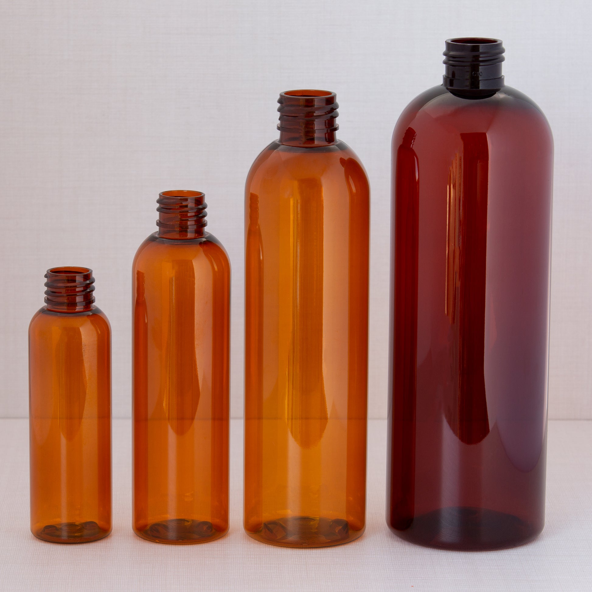 16 oz Amber PET Bullet with 24-410 Natural Disc Top Cap