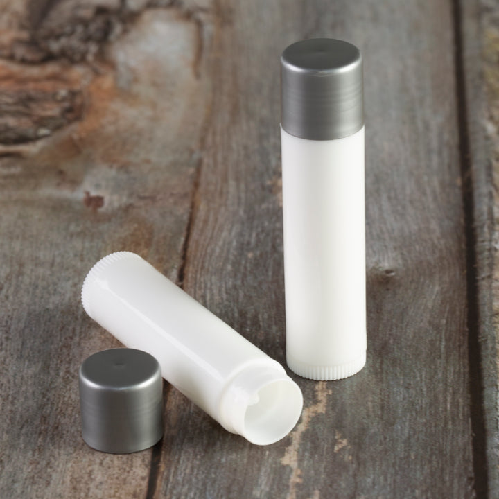 white lip balm tube silver cap